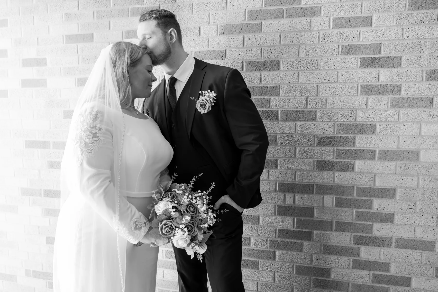 Kamryn and Isaiah on their wedding day at St. Thomas Aquinas in Ames, Iowa