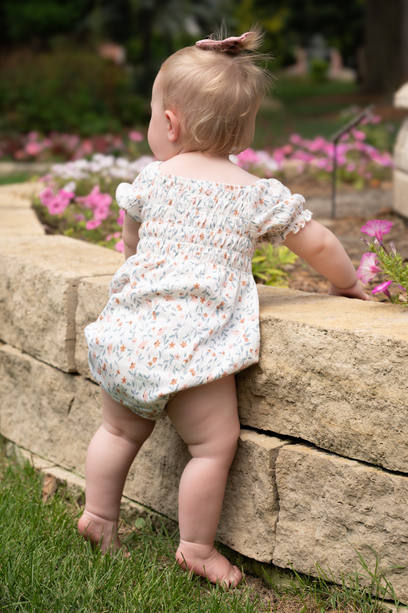 Family photography — baby girl exploring garden wall — Amy Minikus Photo + Film