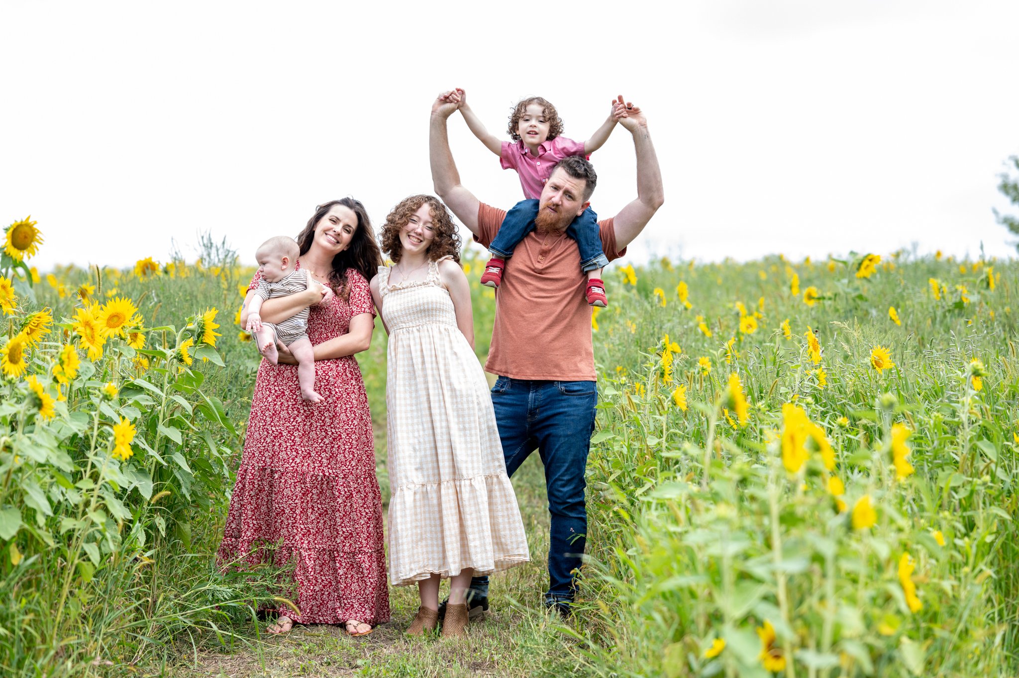 Family photography — family of five in a sunflower field — Amy Minikus Photo + Film