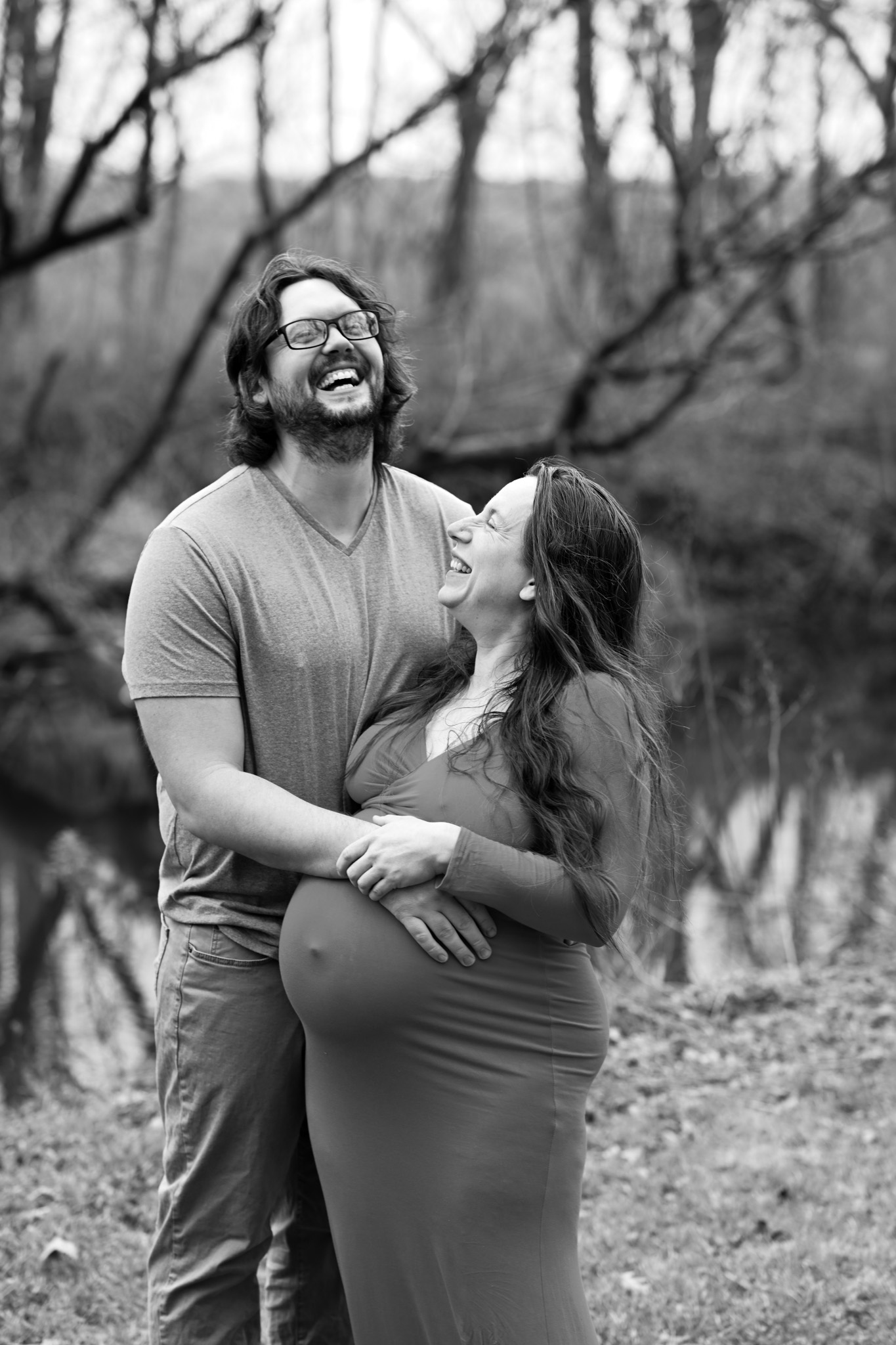 Maternity photography — couple laughing together outdoors — Amy Minikus Photo + Film