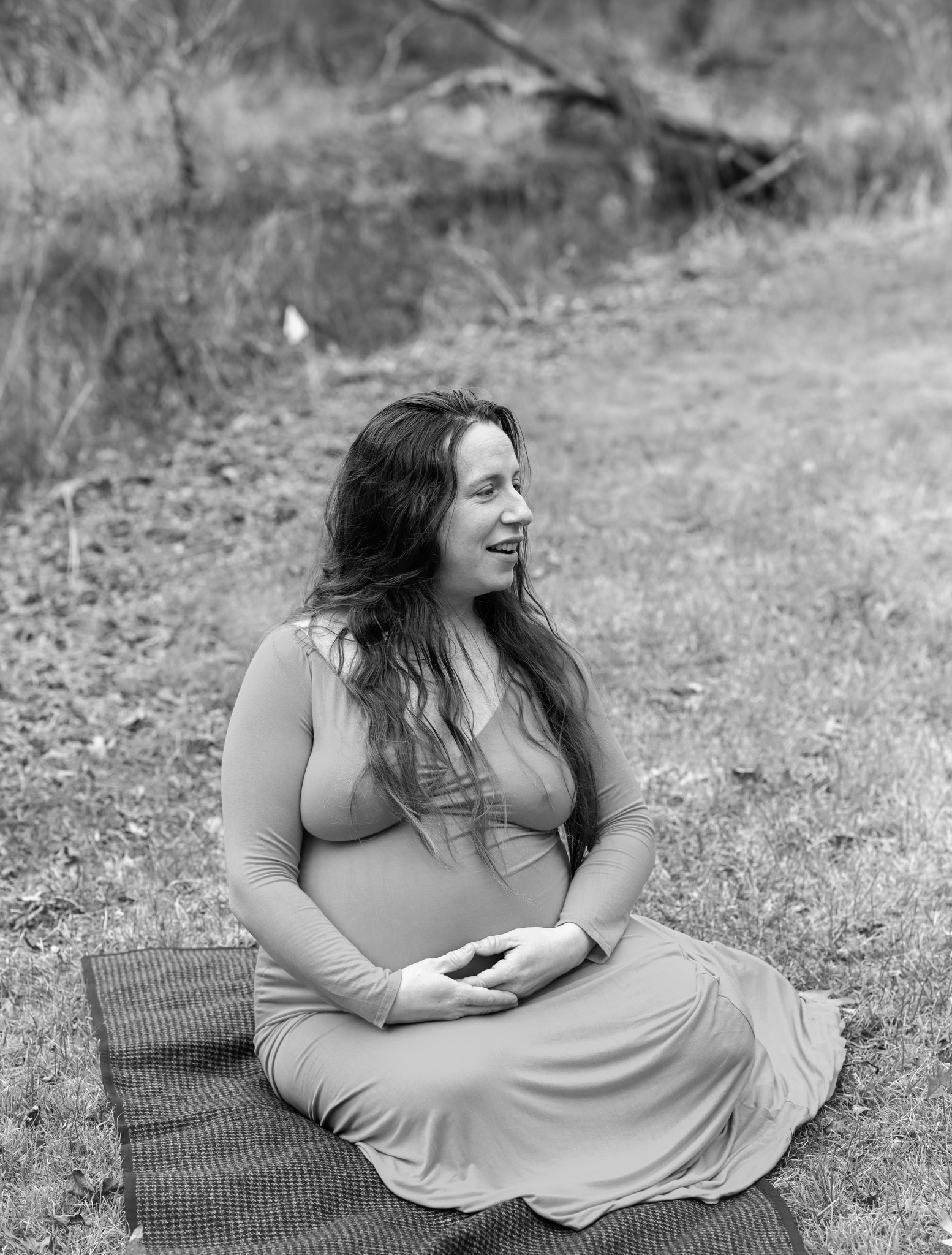 Maternity photography — expectant mother seated in field — Amy Minikus Photo + Film